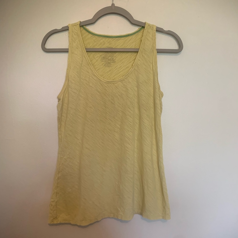 Patagonia distressed medium tank top in yellow with great vibes taken climbing